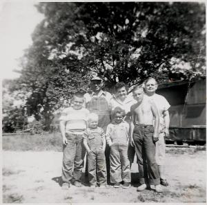 The DeMosses, early 1950s. Front: Tom, Jim, Sandy, Jim. Back: Sam, Edeine, ??.