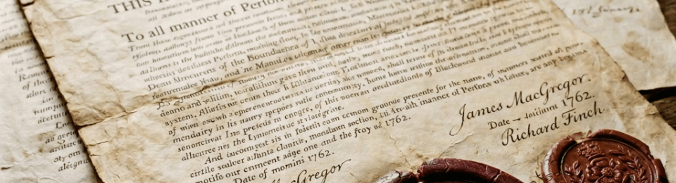 18th-century land grant document with three wax seals and signatures on aged parchment.